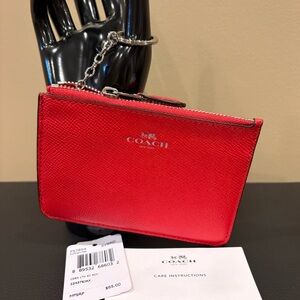 Coach Corner Zip Key Pouch – SV/BRD Red Crossgrain Leather
NWT